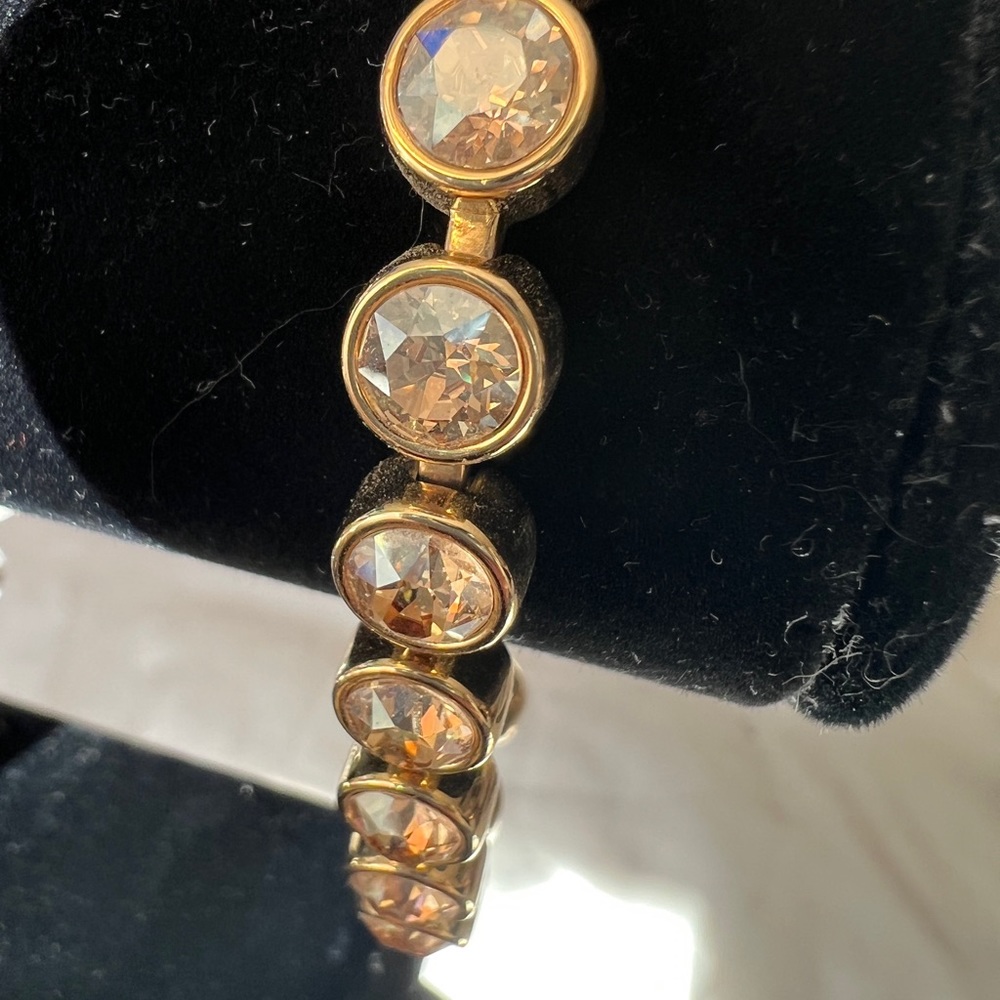 Swarovski touchstone ice bracelet …gold stone /gold tone 7.5 inches